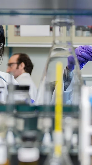 Saudi Aramco scientists in base oils laboratory