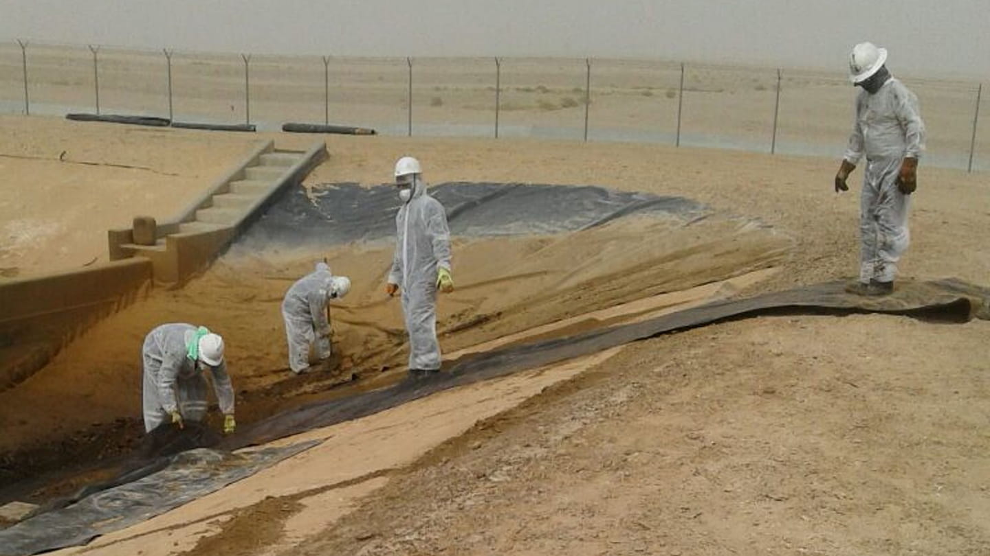 Workers collect 3,500 kilograms of used high-density polyethylene liner from the Haradh Gas Plant evaporation pond for recycling into pellets to be mixed with raw materials for manufacturing plastic products.