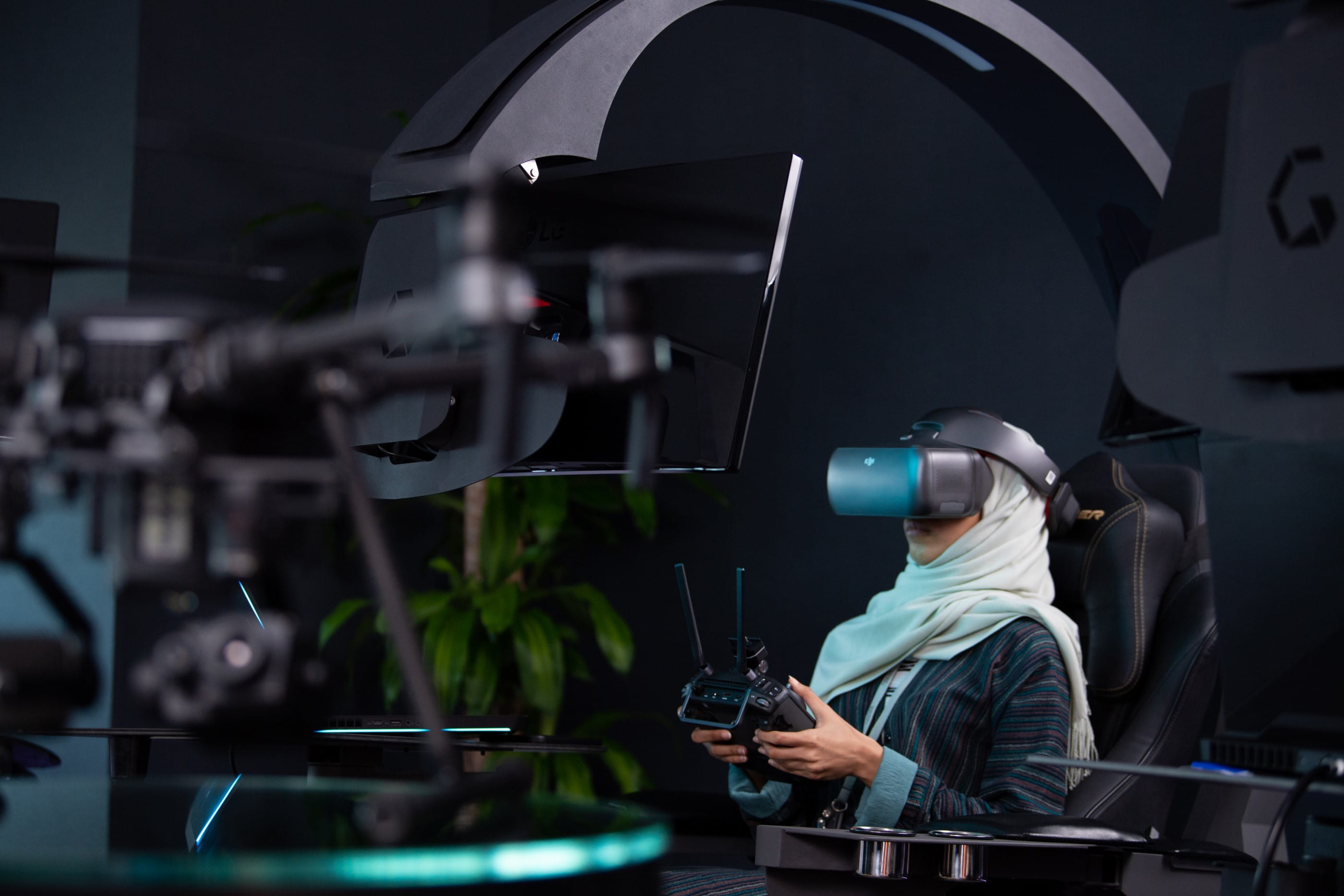Female engineer with VR headset in Aramco 4IR center